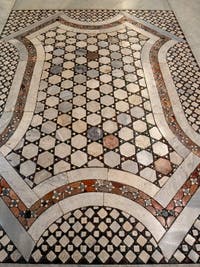 The cosmatesque marble pavement in the central nave of the Basilica of Saint Mary Major in Rome