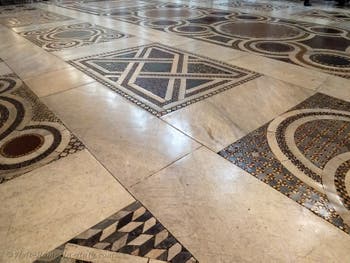 The cosmatesque marble pavement in the central nave of the Basilica of Saint Mary Major in Rome