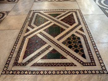 The cosmatesque marble pavement in the central nave of the Basilica of Saint Mary Major in Rome