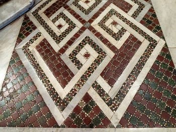 The cosmatesque marble pavement in the central nave of the Basilica of Saint Mary Major in Rome