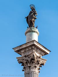 Roman column surmounted by a statue of the Virgin in the square of Saint Mary Major in Rome
